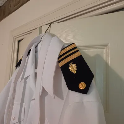Assortment of U.S. Navy Uniforms, Caps & More (B3-JS)