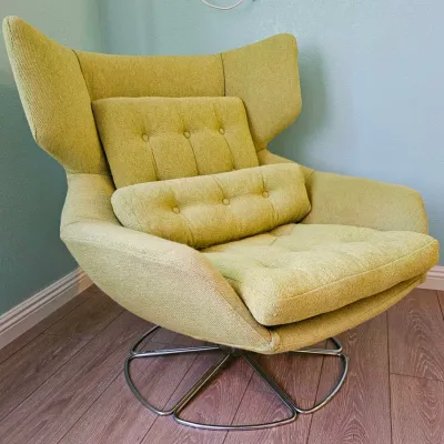 MCM Vintage Wingback Egg Swivel Lounge Chair.