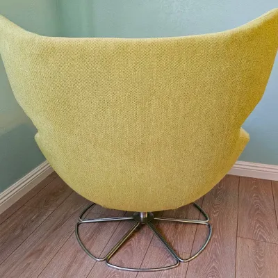 MCM Vintage Wingback Egg Swivel Lounge Chair.