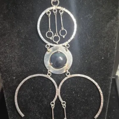 Sale Photo Thumbnail #78: Vintage Modernist Israeli Sterling Silver 925 Pendant & Onyx 925 Earrings coord.

Chain is sterling ....... 15” long.

Vintage Modernist Israeli Sterling Silver 925 pen