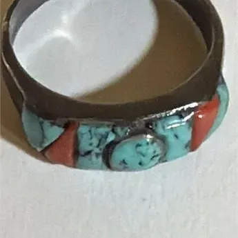 Sale Photo Thumbnail #158: Native American US Handmade Turquoise & Coral Inlay Ring ~ 9.25......marked sterling
Inlays complete and in position. 
Native American US Handmade

Turquoise & Coral Inlay Ring

Sterling silver 925

4.04 g size 9 1/4