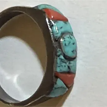 Sale Photo Thumbnail #157: Native American US Handmade Turquoise & Coral Inlay Ring ~ 9.25......marked sterling
Inlays complete and in position. 
Native American US Handmade

Turquoise & Coral Inlay Ring

Sterling silver 925

4.04 g size 9 1/4