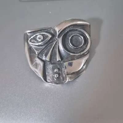 Sale Photo Thumbnail #178: Picasso style Modernist FACE Brooch
Picasso style Modernist FACE Brooch.... purchased by owner in Rhinebeck art show 1980s.

.> excellent condition....tests for sterling....unmarked