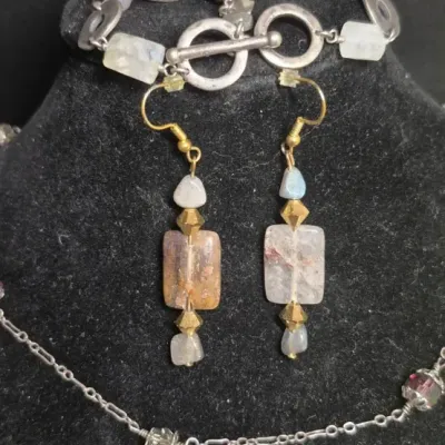 Sale Photo Thumbnail #227: Tres Jolie Toggle Bracelet Sterling & Labradorite Earrings & Sterling Art Nouveau Purple Necklace
> necklace is 16"length.....makers tag attached
> dangle earrings 1"