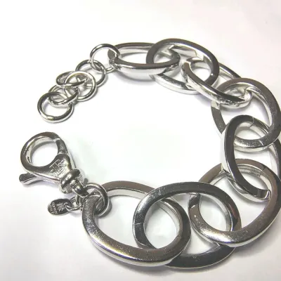 Sale Photo Thumbnail #267: Ralph Lauren Silver Tone Round Triple Link Chain Bracelet. Condition is Pre-owned. 
> superb condition, no scratches
Size 8" with toggle clasp