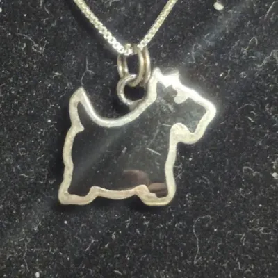 Sale Photo Thumbnail #191: Signed Sterling Resin Scottish Terrier Charm Pendant 2.1g-Illegible Signature and
sterling marked rhinestone  earrings