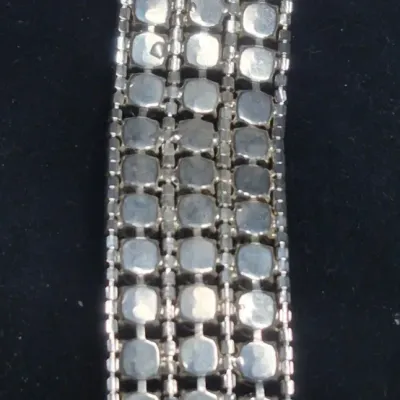 Sale Photo Thumbnail #183: Stunning piece, 1950s diamonds ....lovely Sparkling.

Vintage Rhinestones ador this Bracelet. Beautiful pattern and closure