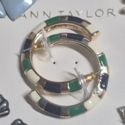 Sale Photo Thumbnail #119: Ann Taylor Sets ~ 2 Necklaces  & 9 pair Earrings
> Necklaces are a silver tone with two spaced Pendants agates w/ tag
> gold tone necklace has small rhinestones sparkling w/ tag
> 9 pair of delicate pairings and an enameled hoop style.... backs  pierced