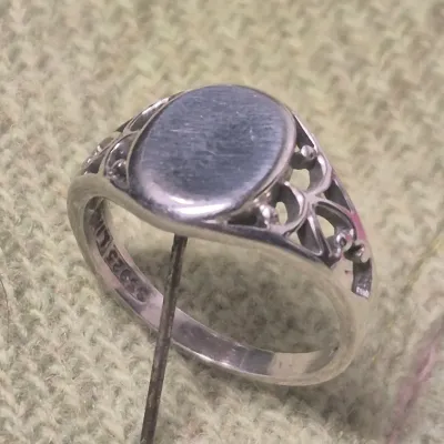 Sale Photo Thumbnail #127: Signed Sterling Ring Sz 7.~ 2.7g
Signed 'LIND' Thailand Sterling Ring Sz 7.~ 2.7g