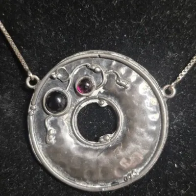 Sale Photo Thumbnail #295: Modernist hammered disc with floral accents 925 & Earrings to set marked 925
necklace is 16" length, marked 
Earrings marked short dangles cluster ....pierced