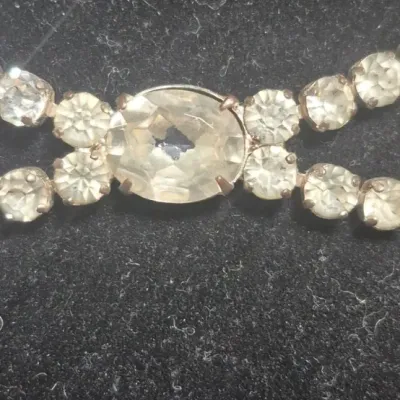 Sale Photo Thumbnail #280: Vintage Rhinestone Choker w/ Sterling Silver heart Earrings ~ marked
Necklace is classic 1980s vintage, with J-clasp closure
Filigree Hear Earrings ~ marked 925