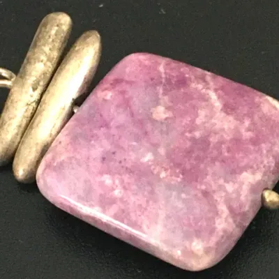 Sale Photo Thumbnail #376: Vintage Necklace Pendant Tested 925 STERLING SILVER Lepidolite Stone on 16" chain
Pendant 1"h / .75" w
chain is sterling marked 16"l