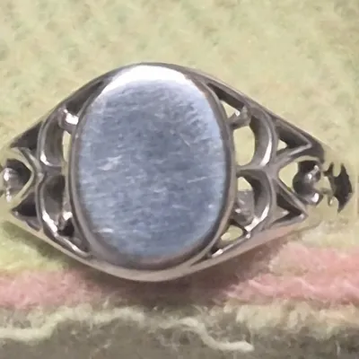 Sale Photo Thumbnail #122: Signed Sterling Ring Sz 7.~ 2.7g
Signed 'LIND' Thailand Sterling Ring Sz 7.~ 2.7g