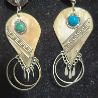 Sale Photo Thumbnail #214: These stunning vintage estate earrings are a luxurious addition to any jewelry collection
dangle size 2" / 1"w
well made, craftsmanship.....unbranded