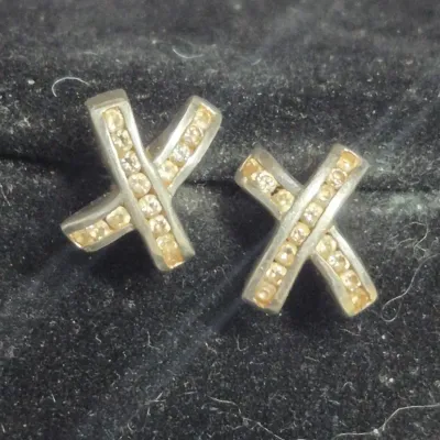 Sale Photo Thumbnail #357: Signed 'K' Sterling Turtle on sterling curb chain 0.2g & pair

sterling "X" files stud Earring