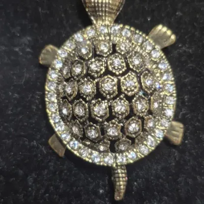 Sale Photo Thumbnail #211: Stunning Animal Pendant Necklaces ~ Turtle & Snake Rhinestone galore !
turtle is 2" on a 16" chain
snake is 4" on a 16" chain
all stones accounted for and original