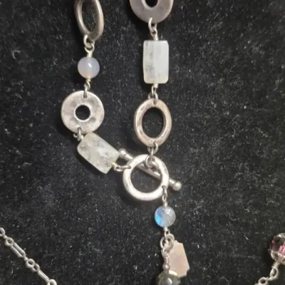 Sale Photo Thumbnail #230: Tres Jolie Toggle Bracelet Sterling & Labradorite Earrings & Sterling Art Nouveau Purple Necklace
> necklace is 16"length.....makers tag attached
> dangle earrings 1"