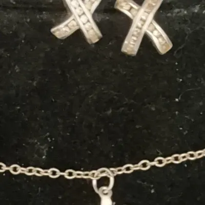 Sale Photo Thumbnail #351: Signed 'K' Sterling Turtle on sterling curb chain 0.2g & pair

sterling "X" files stud Earring