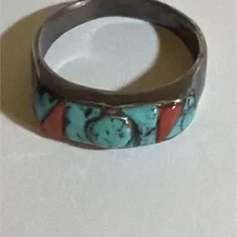 Sale Photo Thumbnail #156: Native American US Handmade Turquoise & Coral Inlay Ring ~ 9.25......marked sterling
Inlays complete and in position. 
Native American US Handmade

Turquoise & Coral Inlay Ring

Sterling silver 925

4.04 g size 9 1/4