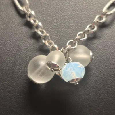 Sale Photo Thumbnail #99: Loft Silvertone w/baby blue bead clumps Necklace 16" & dangle Earrings match
versatile necklace with lobster clasp
all beads are present....16
Earrings are toned to match