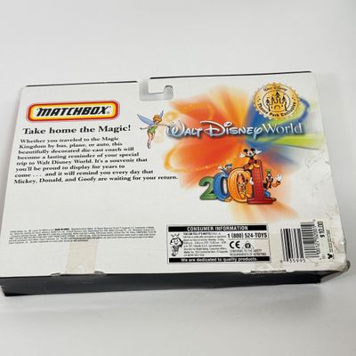 LOT 74P: Walt Disney World 2001 Collection: NIP Matchbox Bus, 2 0 0 1 Trading Pins (2 sets), Lanyards, Disc Ornament & Medallion