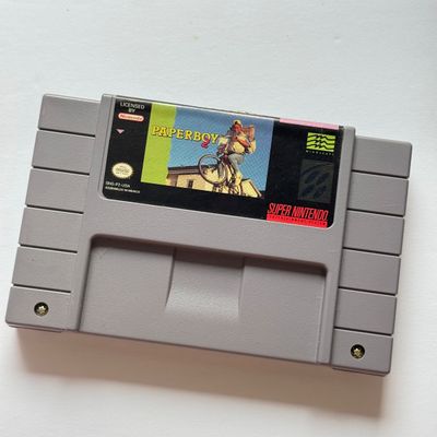 LOT 206V: Vintage Super Nintendo Video Game Cartridges: Super Mario All Stars / Super Mario World, Frogger, Paperboy & Yoshi's...