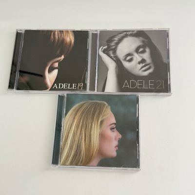LOT 221A: Collection of Pop Icon CDs & DVDs: Adele, Kelly Clarkson, Shania Twain & More