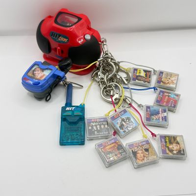 LOT 210V: Vintage Y2K Hit Clips: 2 Different Players, Radio Adapter & 10 Cartridges