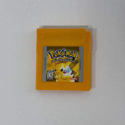 LOT 63A: Pokemon Collection: The First Movie VHS & Soundtrack CD, Special Pikachu Edition Nintendo GameBoy Cartridge & Vintage...