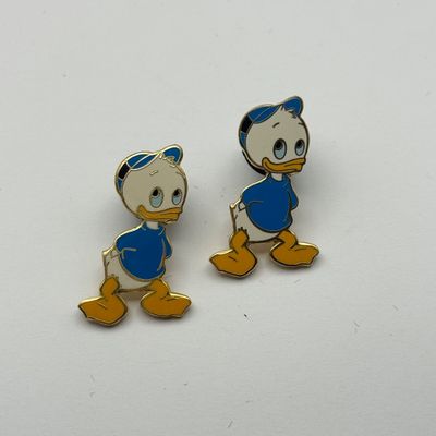 LOT 117P: WDW Trading Pins: Donald & Family, Goofy, June Birthstone Minnie, Pluto