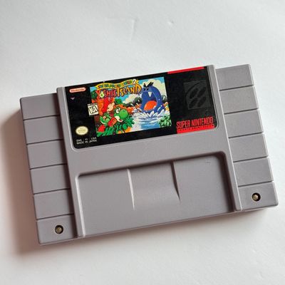 LOT 206V: Vintage Super Nintendo Video Game Cartridges: Super Mario All Stars / Super Mario World, Frogger, Paperboy & Yoshi's...