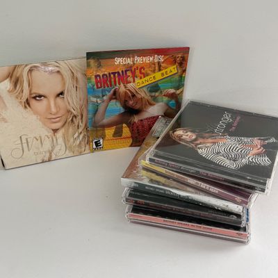 LOT 87A: Britney Spears Collection: Concert Programs, Framed & Unframed Posters, CDs, DVDs & More