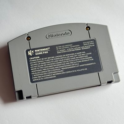 LOT 205V: Vintage Nintendo N64 Video Game Consoles: 007, Wayne Gretzky & More