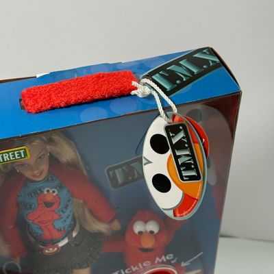 LOT 64A: NIB Sesame Street TMX Tickle Me Elmo 10th Anniversary Toy & TMX Tickle Me Elmo Barbie NRFB