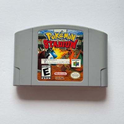 LOT 201V: Vintage Nintendo N64 Video Game Cartridges: Pokémon Stadium, Mario Kart 64, Paper Boy, Toy Story 2, Rugrats in Paris & Elmo...