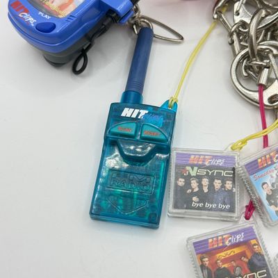 LOT 210V: Vintage Y2K Hit Clips: 2 Different Players, Radio Adapter & 10 Cartridges