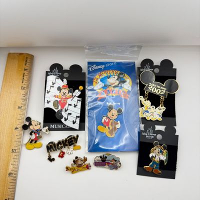 LOT 118P: Disney Mickey Pins incl WDW Trading Pins: 2002 Musical Conductor, Name w Danglers, 2002 Ears to You Dangler, Pin Trading,...
