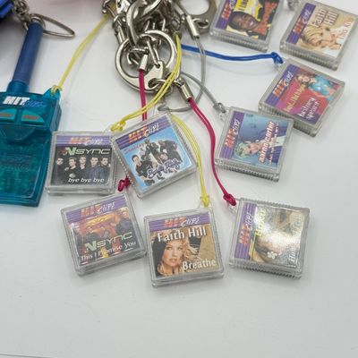LOT 210V: Vintage Y2K Hit Clips: 2 Different Players, Radio Adapter & 10 Cartridges