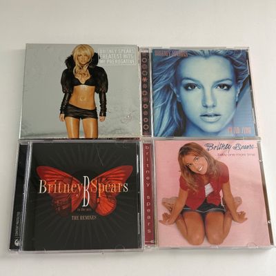 LOT 87A: Britney Spears Collection: Concert Programs, Framed & Unframed Posters, CDs, DVDs & More