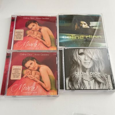 LOT 90A: Celine Dion Collection: For Keeps Book, Concert Book, Tapes, CDs & DVDs