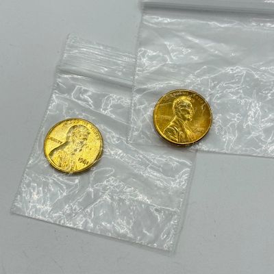 LOT 152F: Artistic Engravings 23karat Gold Plated Farewell ZR-1 Card, Plated 1980s Pennies & More Coins