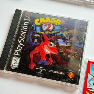 LOT 204V: Sony PlayStation 2 DDR Disney & PS1 Games: Frogger, Crash Bandicoot 2 (holo cover), Soviet Strike, 007 & More