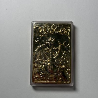 LOT 62A: FULL SET Pokémon Special Edition 23 karat Gold Plated Trading Cards: Charizard, Pikachu, Jiggly Puff, Poliwhirl, Mewtwo &...
