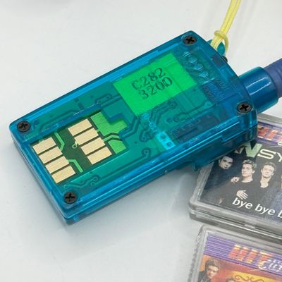 LOT 210V: Vintage Y2K Hit Clips: 2 Different Players, Radio Adapter & 10 Cartridges