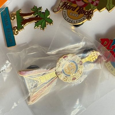 LOT 178J: Collectible Pins: Outback, Universal Studios, Hard Rock Cafe & More