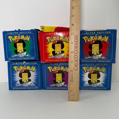LOT 62A: FULL SET Pokémon Special Edition 23 karat Gold Plated Trading Cards: Charizard, Pikachu, Jiggly Puff, Poliwhirl, Mewtwo &...