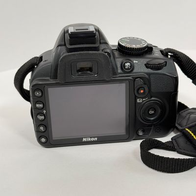 LOT 69A: Nikon D3100 Camera Body w/ Mod Camera Strap (NO BATTERY)