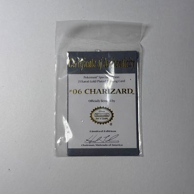 LOT 62A: FULL SET Pokémon Special Edition 23 karat Gold Plated Trading Cards: Charizard, Pikachu, Jiggly Puff, Poliwhirl, Mewtwo &...