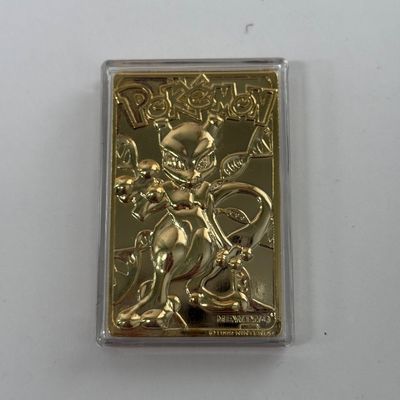 LOT 62A: FULL SET Pokémon Special Edition 23 karat Gold Plated Trading Cards: Charizard, Pikachu, Jiggly Puff, Poliwhirl, Mewtwo &...