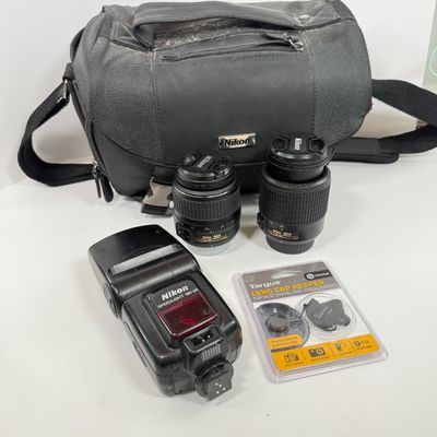 LOT 70A: Nikon Speedlight SB-25 External Flash, Nikon DX Lenses: 18-55mm & 55-200mm, Nikon Camera Bag & More